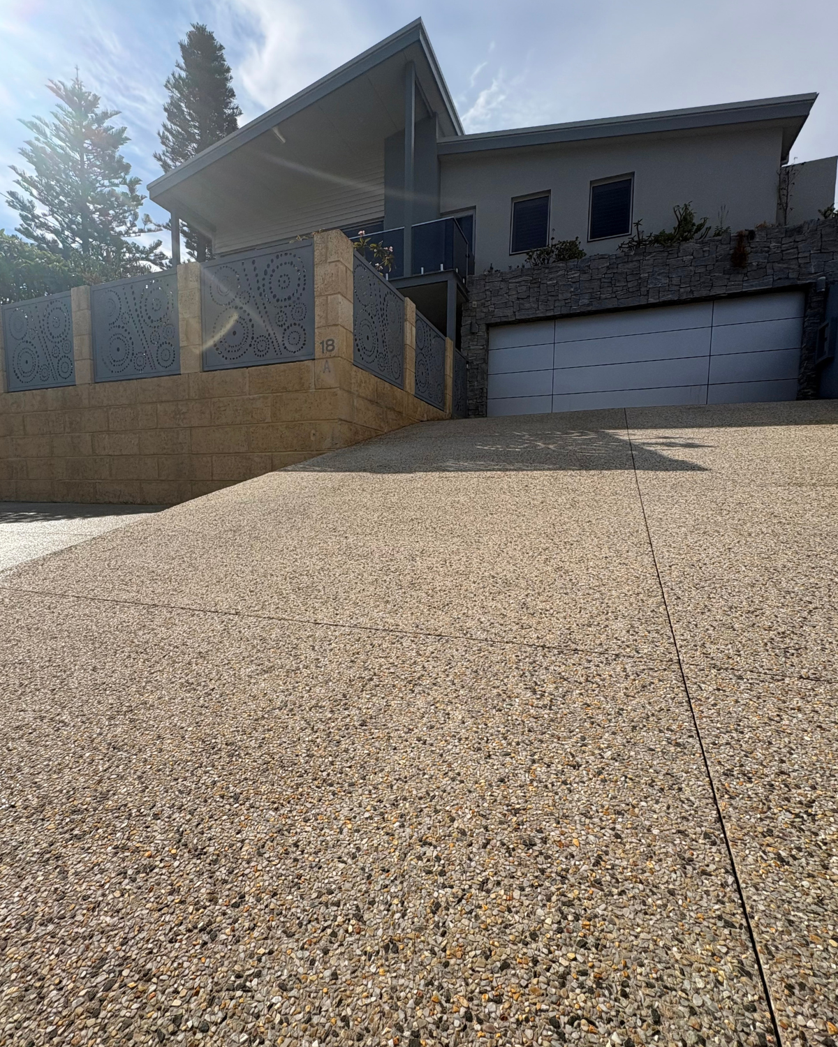 Sealed exposed aggregate concrete driveway in Mandurah